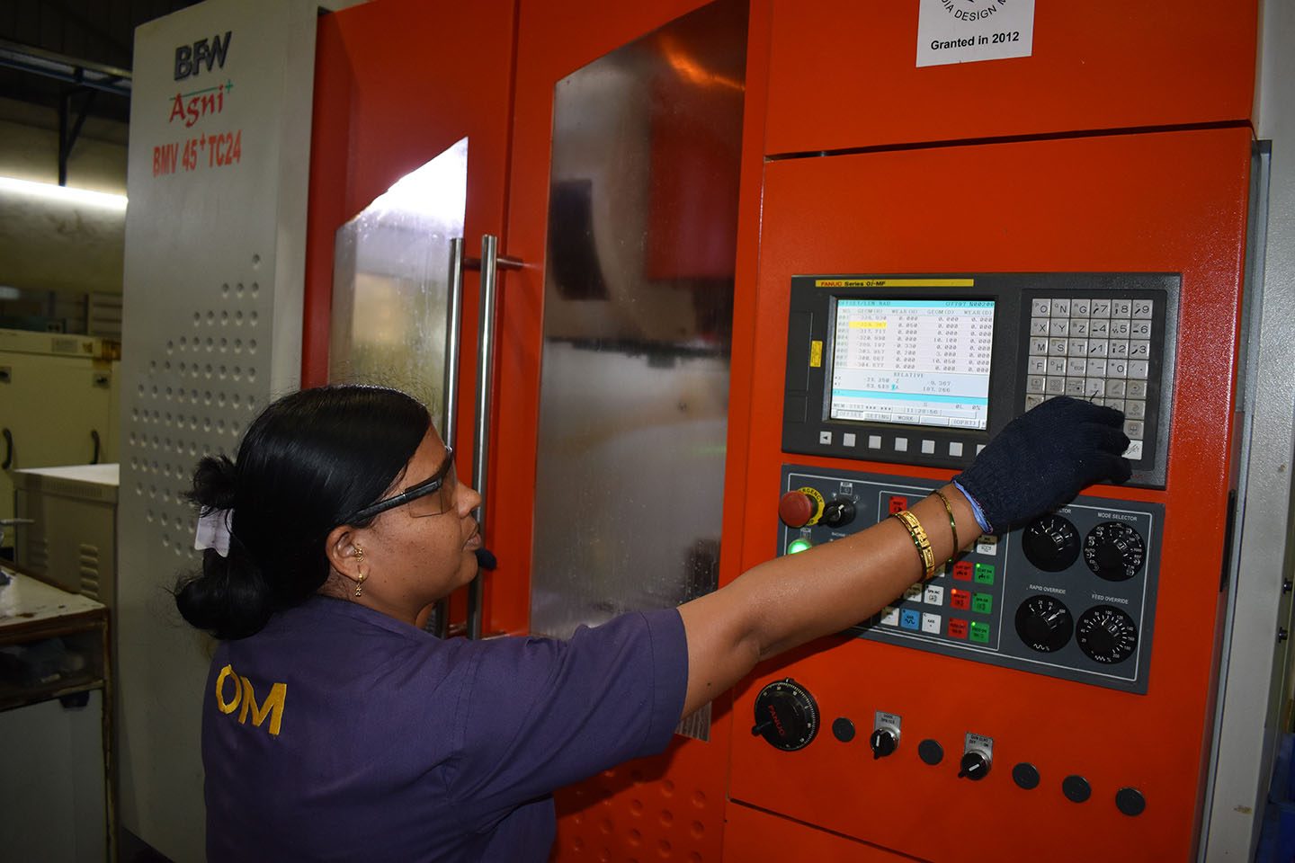 A PSCPL operator entering offsets at the control of a vertical machining centre
